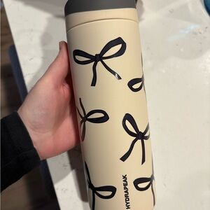 Hydrapeak Cream Tumbler with Black Bow Design
